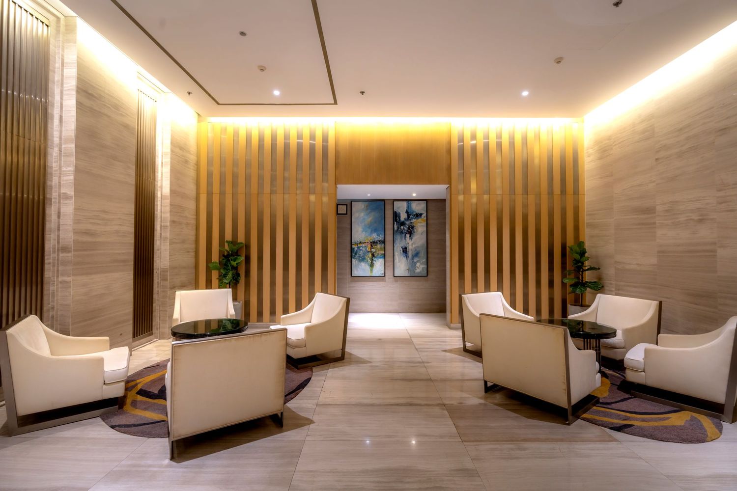 A hotel lobby, lit and measured
